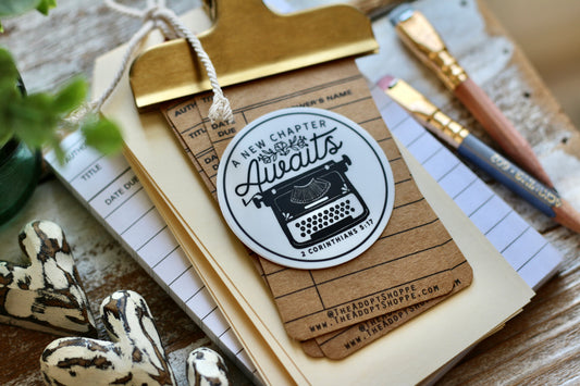 a new chapter awaits - typewriter (2 Corinthians 5:17) waterproof vinyl sticker decal