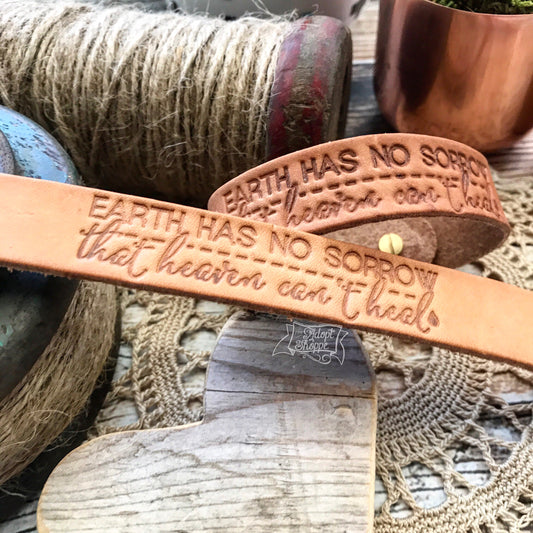 earth has no sorrow that heaven can't heal (camel/natural) leather cuff