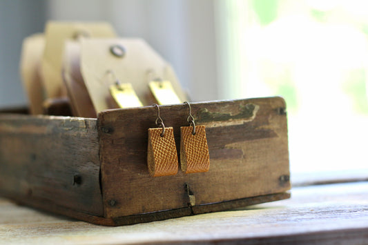 simple loop genuine leather earrings in mustard yellow pebbles