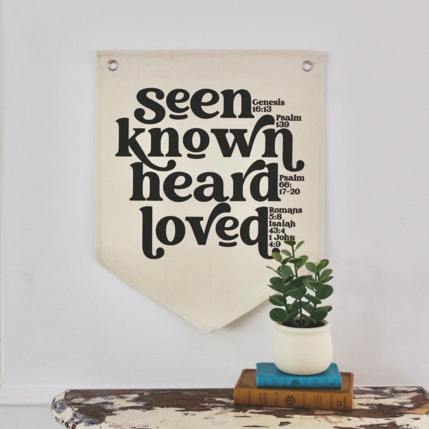 seen. known. heard. loved. natural canvas wall flag
