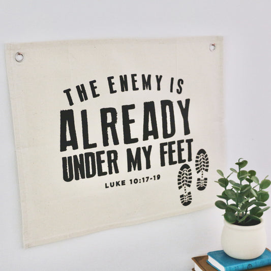the enemy is already under my feet canvas wall flag