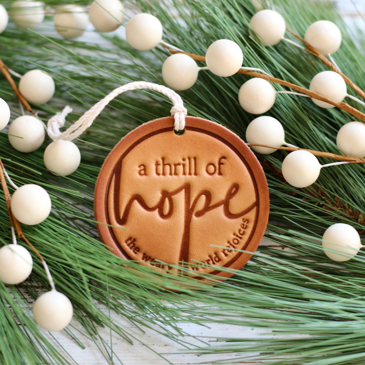 a thrill of hope - the weary world rejoices - leather hand-stamped ornament
