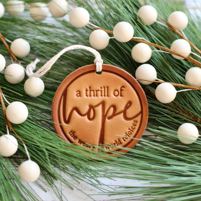 a thrill of hope - the weary world rejoices - leather hand-stamped ornament
