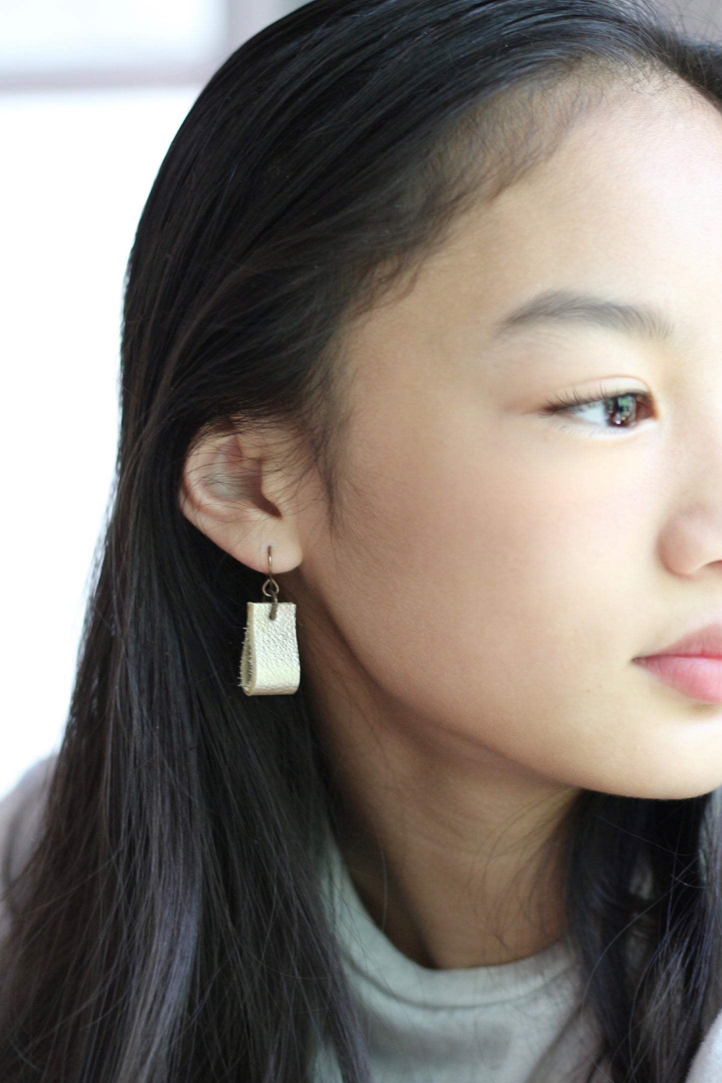 simple loop genuine leather earrings in peach shimmer