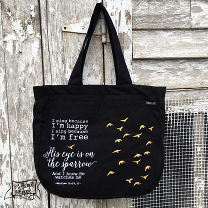 His eye is on the sparrow hymn gold foil black fair trade tote bag