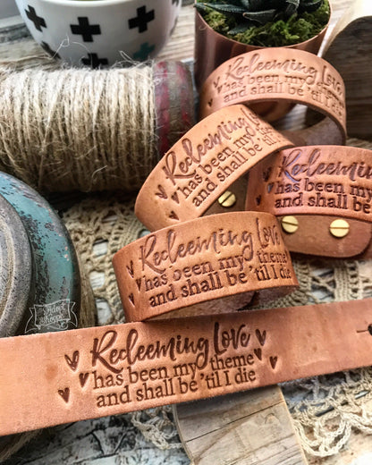 redeeming love has been my theme and shall be 'til i die hymn (natural camel) leather cuff