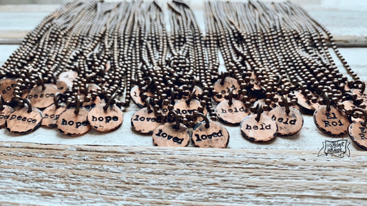 tiny hand-stamped copper disc necklace