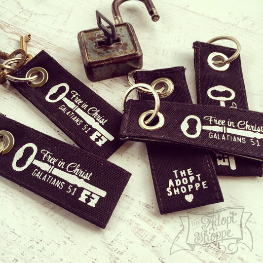 free in Christ black vintage key fair trade key fob