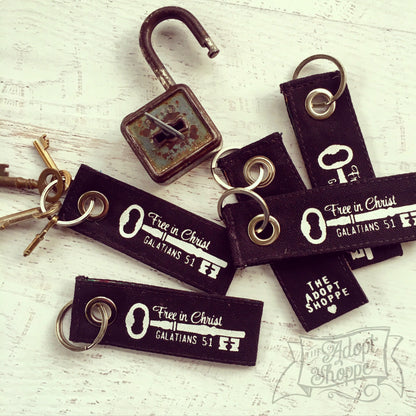 free in Christ black vintage key fair trade key fob