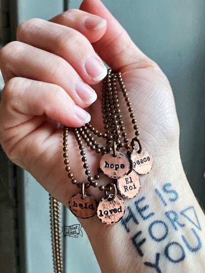 tiny hand-stamped copper disc necklace