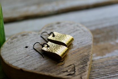 simple loop genuine leather earrings in shimmery gold