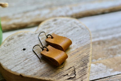 simple loop genuine leather earrings in smooth mustard yellow